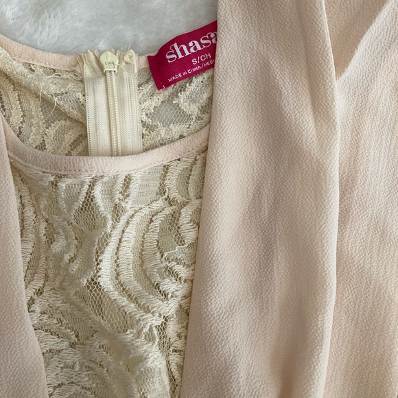 Tan lace romper that zips up from the back. - Picture 1 of 2